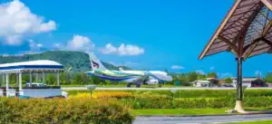 Bangkok Airways plane arriving at the tropical Koh Samui Airport in Thailand.