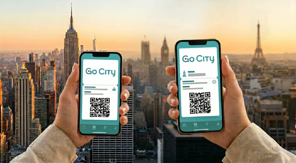First-person perspective of two hands holding smartphones displaying Go City digital passes with QR codes against a blended skyline of New York and Paris.