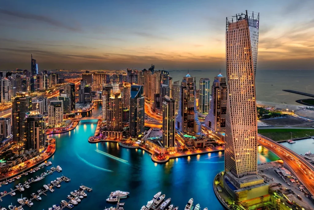 The iconic, ring-shaped Museum of the Future in Dubai, featuring intricate Arabic calligraphy, surrounded by modern skyscrapers and greenery.