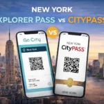 A comparison graphic featuring two smartphones displaying the New York Explorer Pass and New York CityPASS QR codes against a New York City skyline.