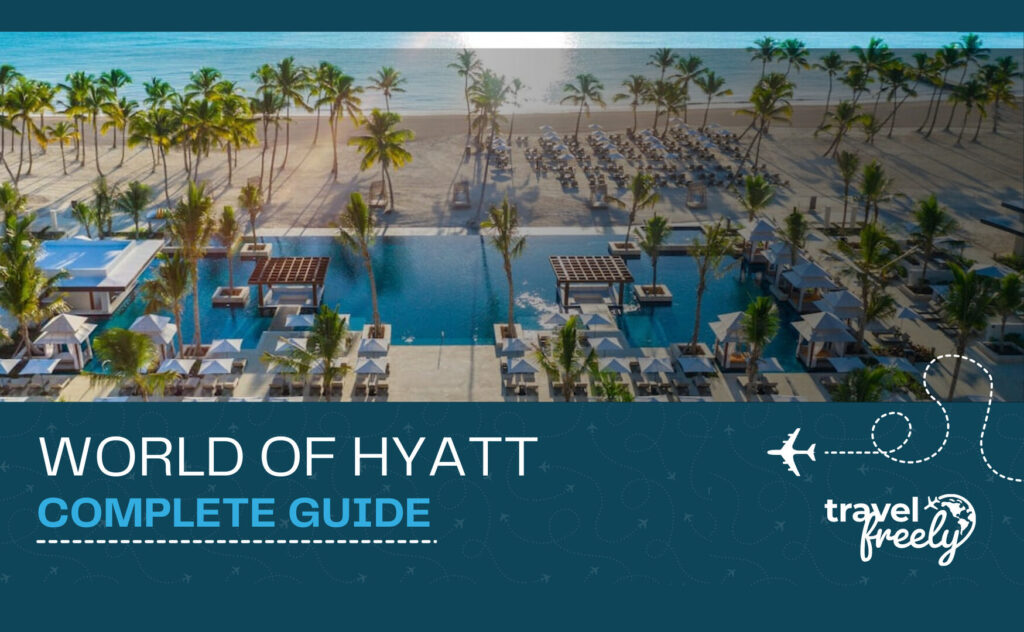 Banner for the World of Hyatt Complete Guide featuring an aerial view of a luxury tropical resort with a pool and beach
